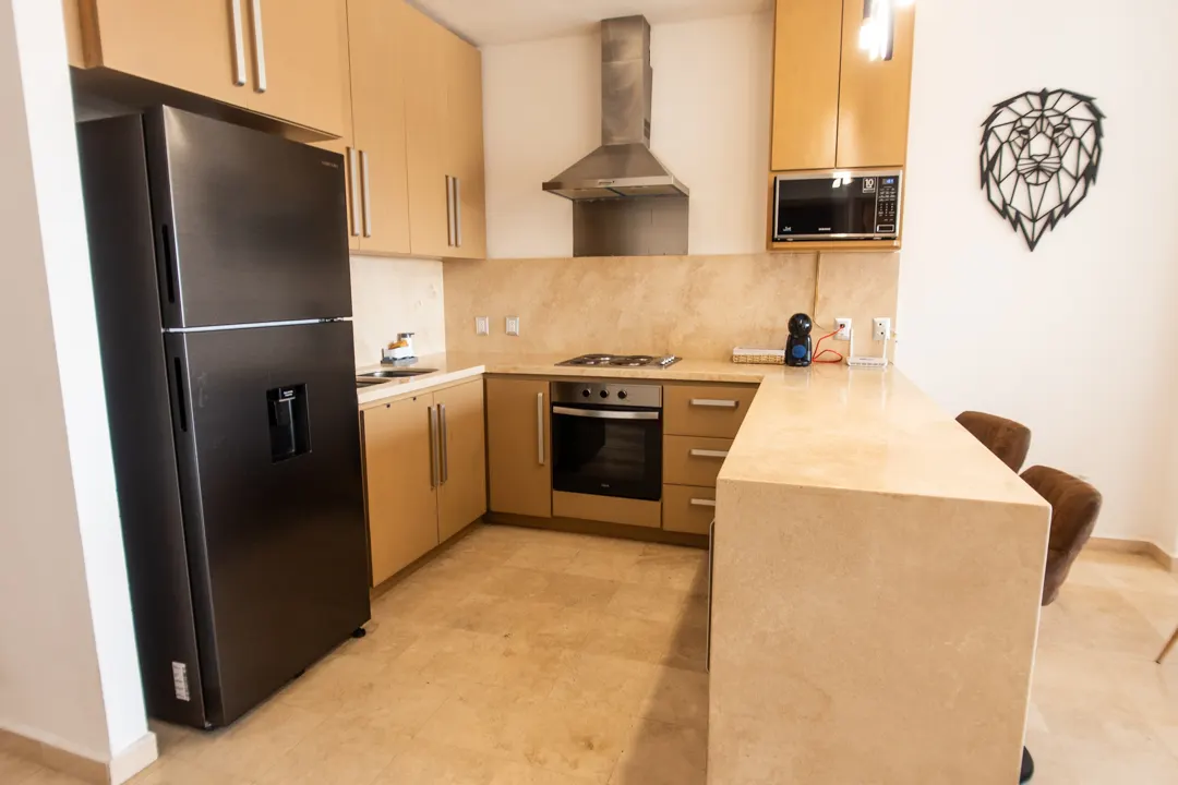 cocina con campana departamento renta marina