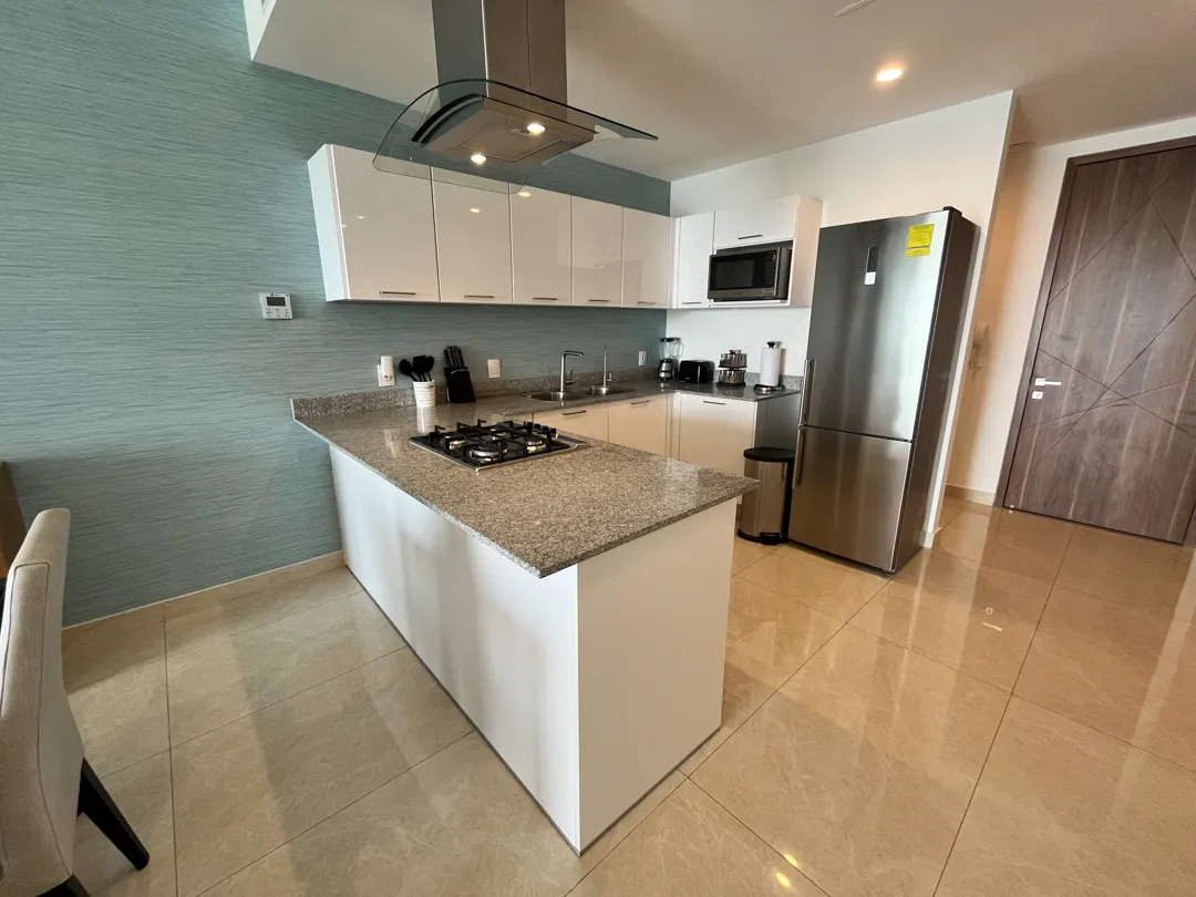 cocina y refrigerador departamento en venta camino al mar zona dorada