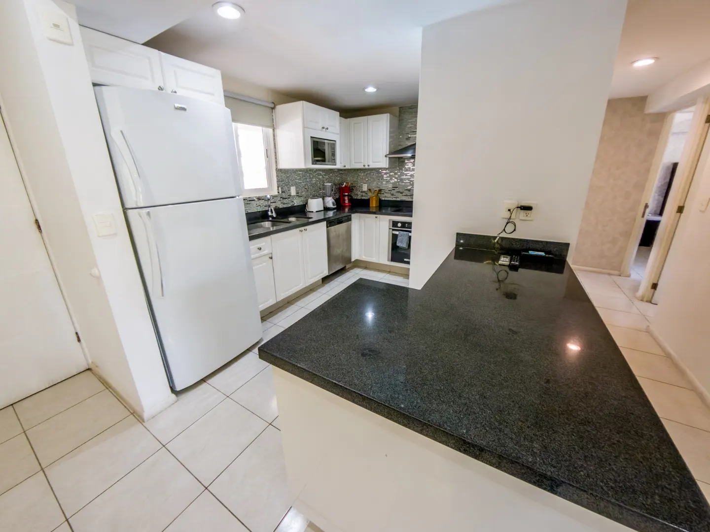 cocina y desayunador departamento venta quintas II