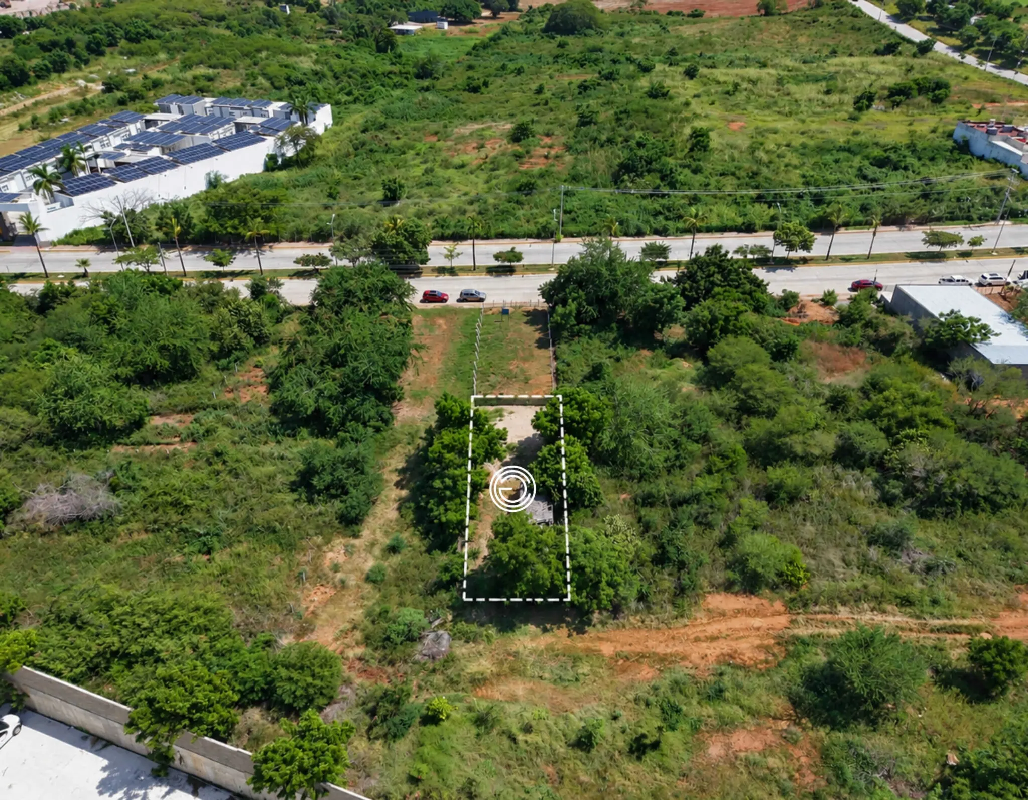 terreno-venta-villa-universidad-galerias-mazatlan-luis11 Delimitación del terreno en venta en Marina Universidad, Mazatlán, vista desde dron
